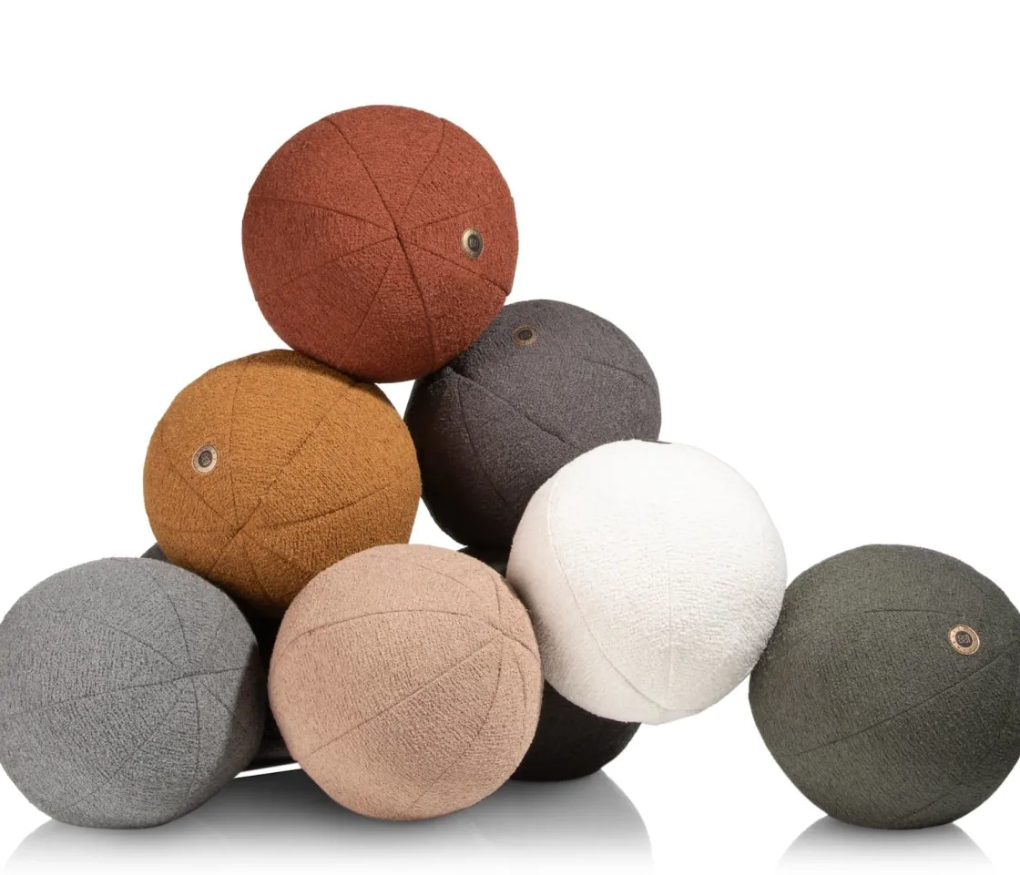 XOOON Timeless Scott kussen dia 25cm in de kleur Koper - COCOmaison^ Woonaccessoires